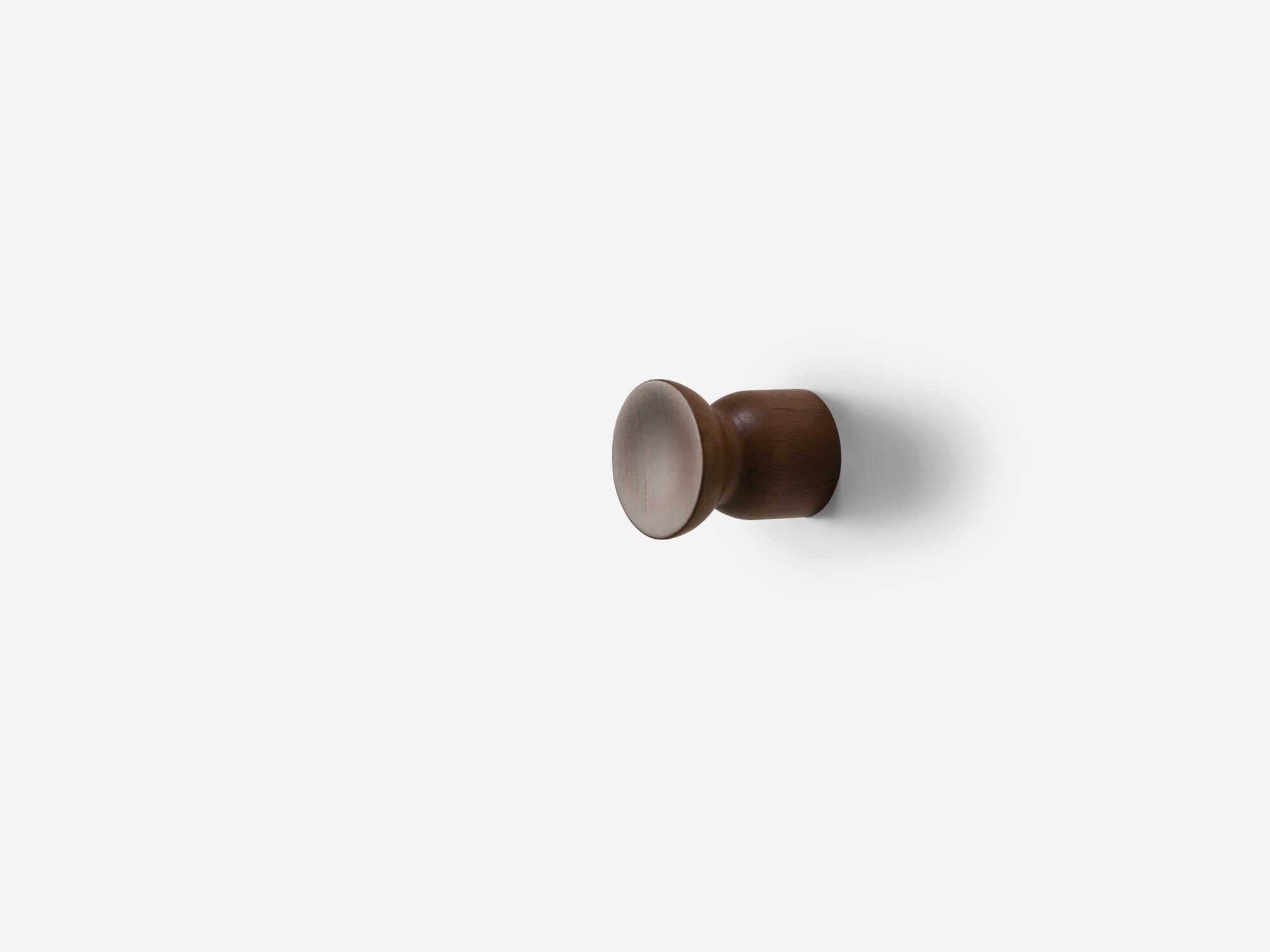 Small walnut wall hook angle view